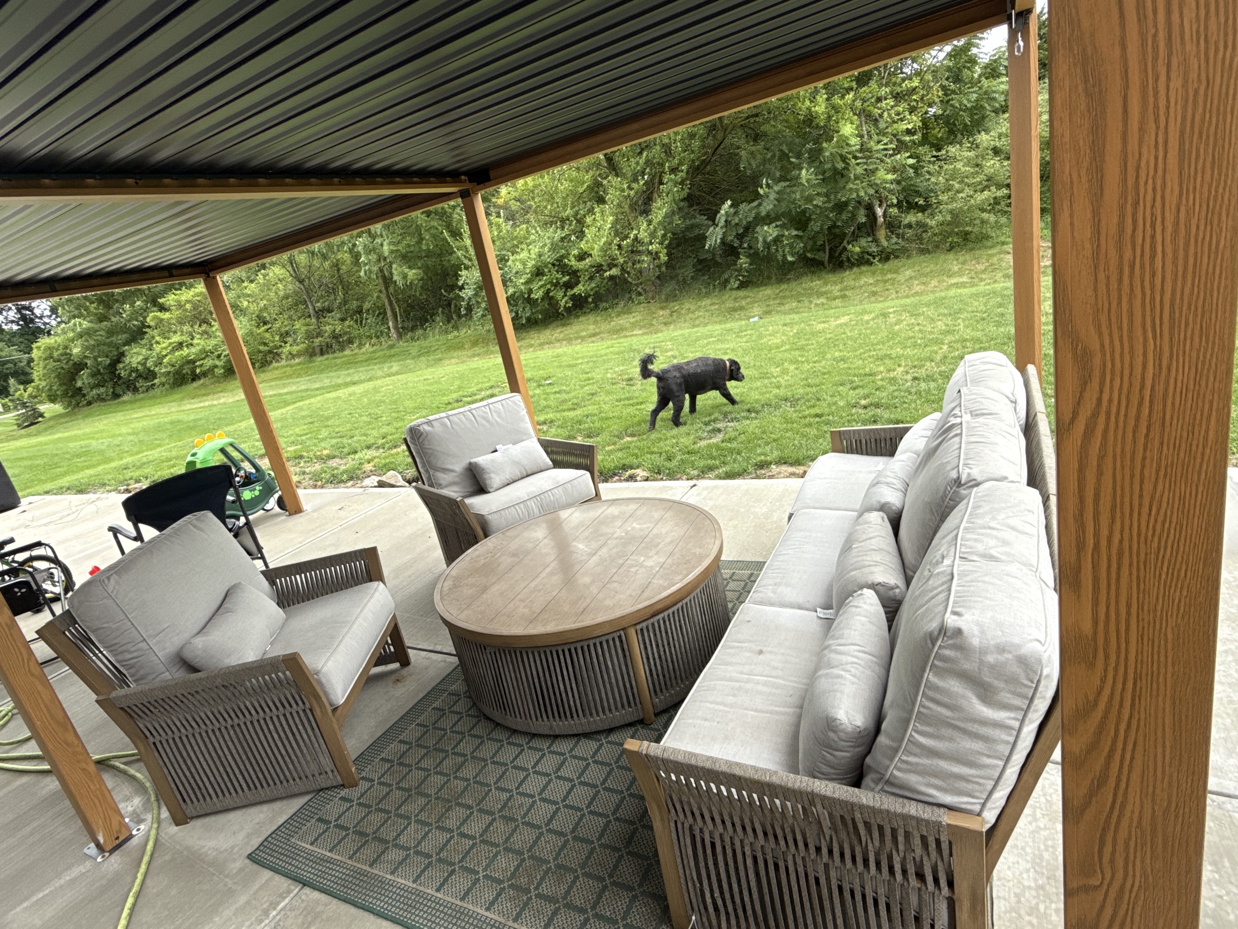 Finished patio with pergola and outdoor furniture
